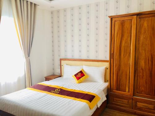 Cama o camas de una habitación en Selima Hotel