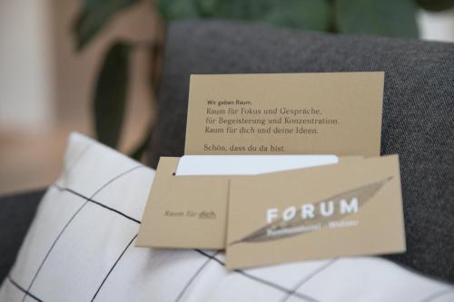 a brown box sitting on top of a couch at Businesshotel Forum Widnau in Widnau