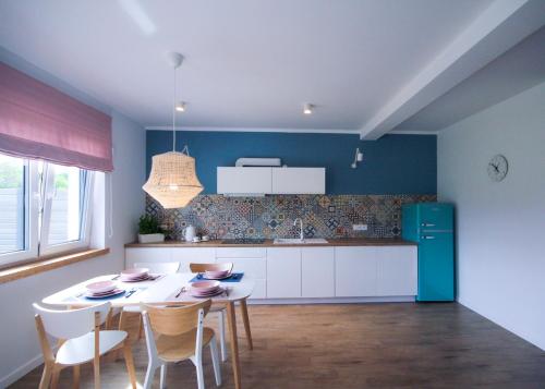 Η κουζίνα ή μικρή κουζίνα στο Apartamenty Skarpa