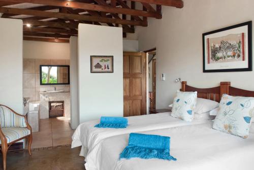 Postel nebo postele na pokoji v ubytování Ama Casa Cottages