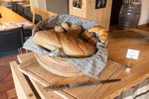 a loaf of bread sitting on top of a table at Hotel Ucliva in Waltensburg