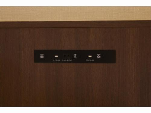 a close up of a wooden door with a control panel at Rinn Miyagawacho Grande in Kyoto