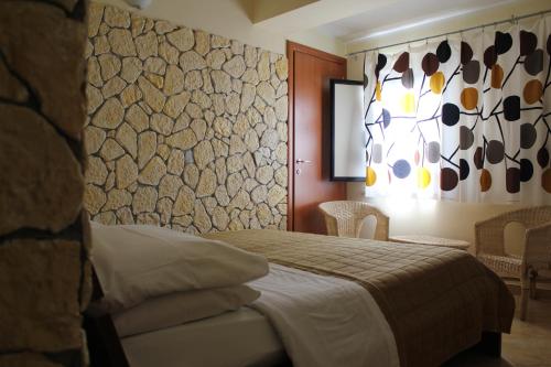 Postel nebo postele na pokoji v ubytování Hotel 106