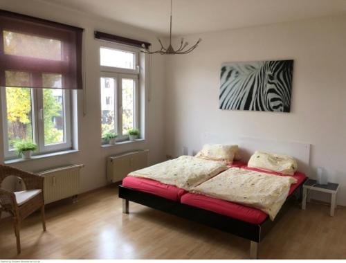 A bed or beds in a room at Ferienwohnung Zentrum - Albert