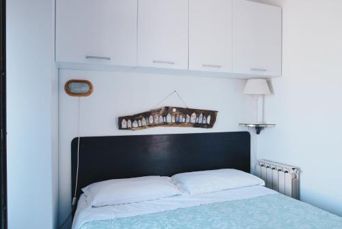 La Torretta tesisinde bir odada yatak veya yataklar