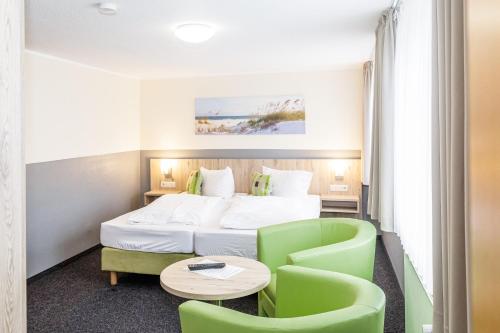 Postel nebo postele na pokoji v ubytování Gästehaus Alexandra