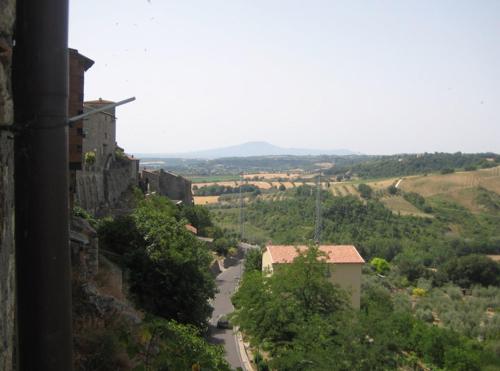 a view of a road in a town with a mountain at Casa Mimmo in Castiglione in Teverina