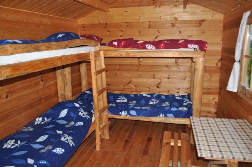Ένα ή περισσότερα κρεβάτια σε δωμάτιο στο Campsite Leiputrija