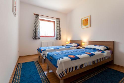 Posteľ alebo postele v izbe v ubytovaní Apartments Belavic by El-Pi Tours