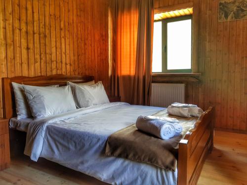 Postel nebo postele na pokoji v ubytování Bana