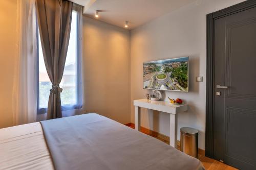 Postel nebo postele na pokoji v ubytování Hotel M