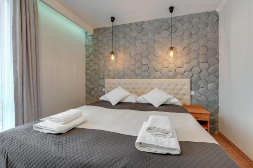 Cama o camas de una habitación en Aster
