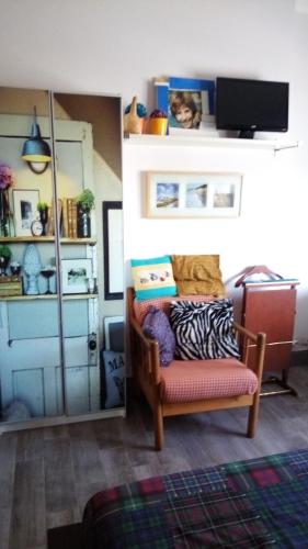 Χώρος καθιστικού στο Vely's Rooms
