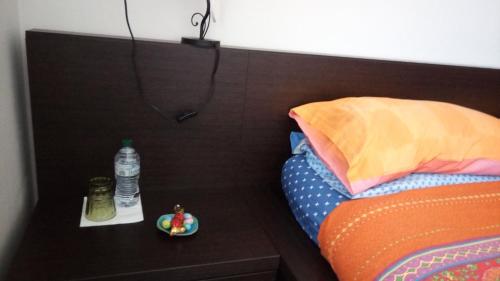 Ένα ή περισσότερα κρεβάτια σε δωμάτιο στο Vely's Rooms