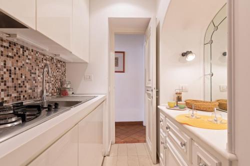 Køkken eller tekøkken på Rome As You Feel - Cancelli Apartment