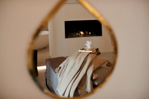 Postel nebo postele na pokoji v ubytování Musae Relais & SPA