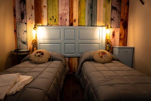 Llit o llits en una habitació de Agriturismo le Capannacce Urbania