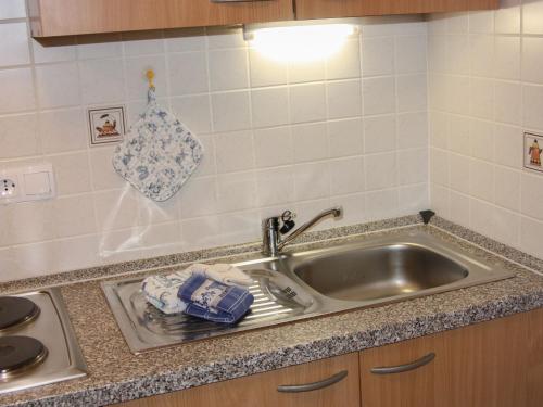 a stainless steel sink in a kitchen with at Ferienwohnung Biederbick in Diemelsee