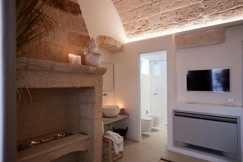 Koupelna v ubytování Musae Relais & SPA