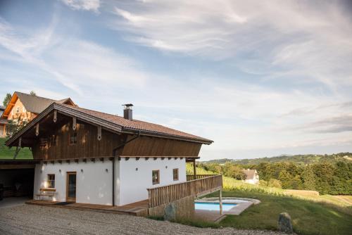 a barn conversion with a wooden roof at Liebe zur Steiermark / Haus Tyrol in Jagerberg