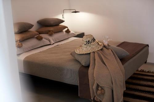 Postel nebo postele na pokoji v ubytování Musae Relais & SPA