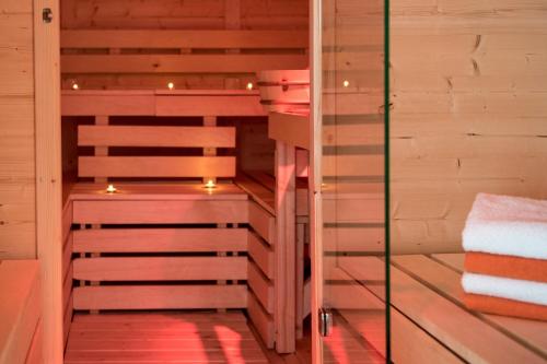 a sauna with candles in the middle of it at Liebe zur Steiermark / Haus Tyrol in Jagerberg