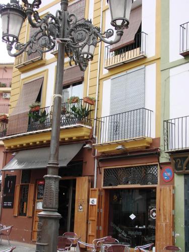a street light in front of a building at Las Coles Apartasuites in Xàtiva