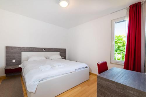 Voodi või voodid majutusasutuse Sunset Apartment Petrcane toas