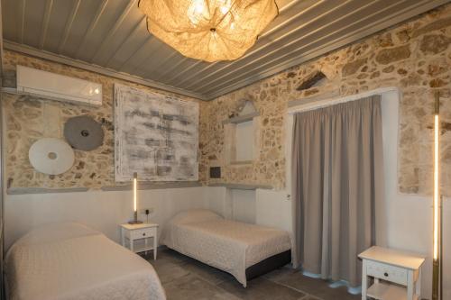 Postel nebo postele na pokoji v ubytování Casa Vitae Villas