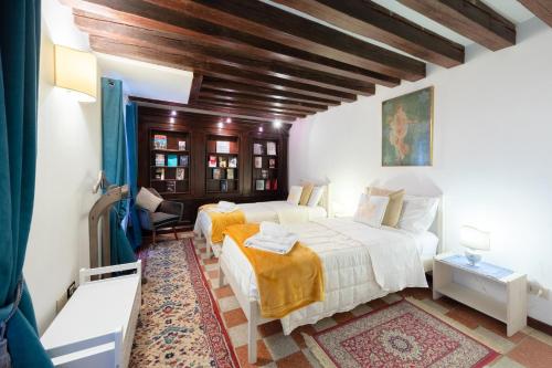 Postel nebo postele na pokoji v ubytování Ca' del Carro Family Apartment