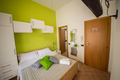 Katil atau katil-katil dalam bilik di 'A Cumerdia - Casa Vacanze