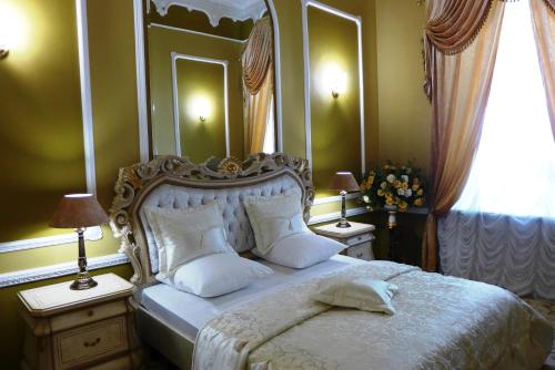 Posteľ alebo postele v izbe v ubytovaní Prestige Hotel