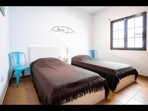 Ένα ή περισσότερα κρεβάτια σε δωμάτιο στο Casa Ocean View