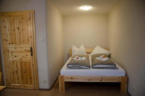 Ένα ή περισσότερα κρεβάτια σε δωμάτιο στο Apartmány Terra