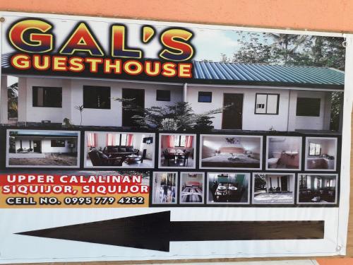 a store sign for a sales questionnaire in front of a house at Gal's Guesthouse in Siquijor