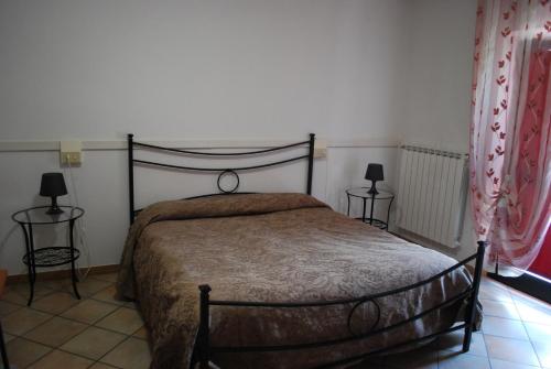 Posteľ alebo postele v izbe v ubytovaní Villa Flora