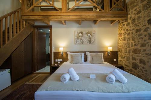 Postel nebo postele na pokoji v ubytování D'Argento Boutique Rooms