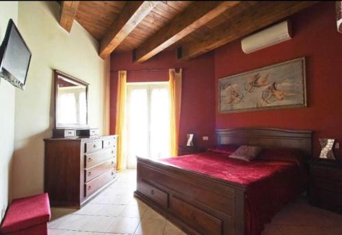 Un pat sau paturi într-o cameră la Dal centurione