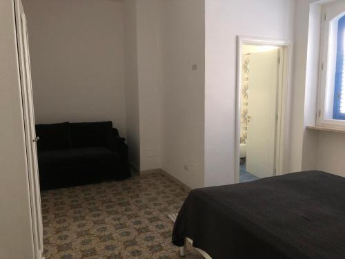 Postel nebo postele na pokoji v ubytování Casa direttamente sul mare 1