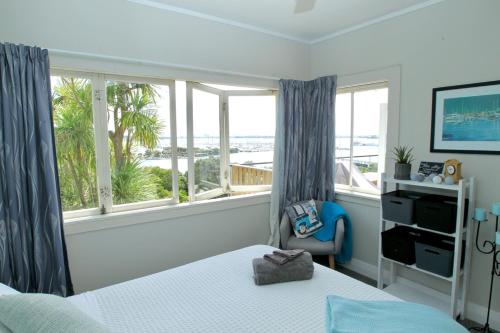 Postel nebo postele na pokoji v ubytování Million Dollar View