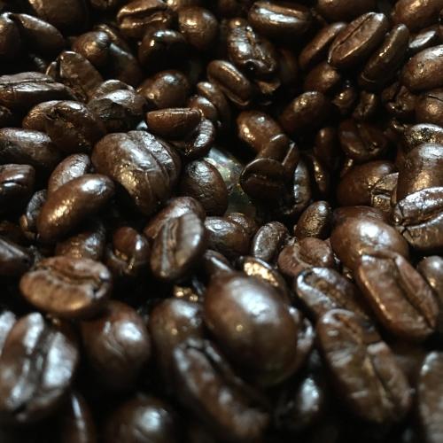 a close up of a pile of coffee beans at The Green land (Khok Kruat) in Nakhon Ratchasima