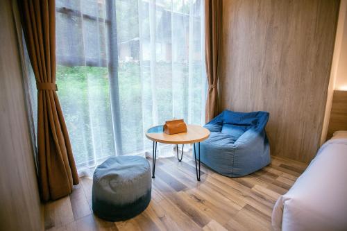 Posezení v ubytování Whispering Mountains Boutique Hotel