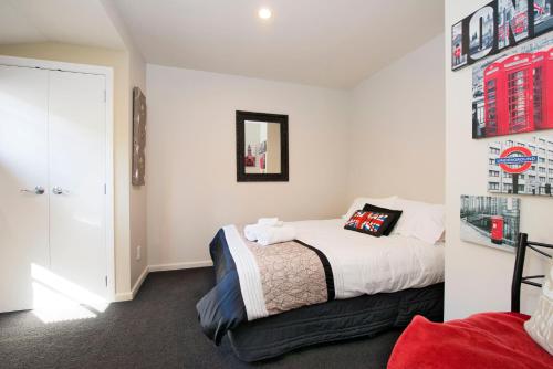 a bedroom with a bed in a room at Selah Retreat in Nelson
