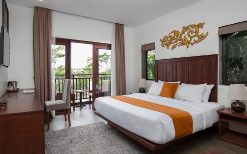 Tempat tidur dalam kamar di Won Residence & Spa