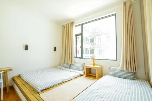 Postel nebo postele na pokoji v ubytování Monster B&B