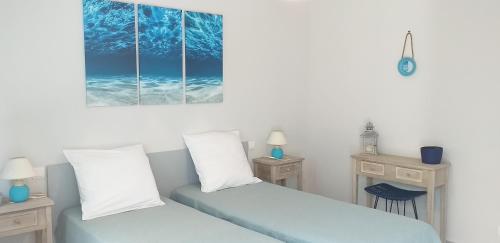 Posteľ alebo postele v izbe v ubytovaní Le Golfe