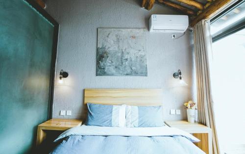 Postel nebo postele na pokoji v ubytování Monster B&B