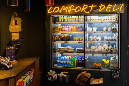 a refrigerator filled with lots of food and drinks at Comfort Hotel Xpress Stockholm Central in Stockholm