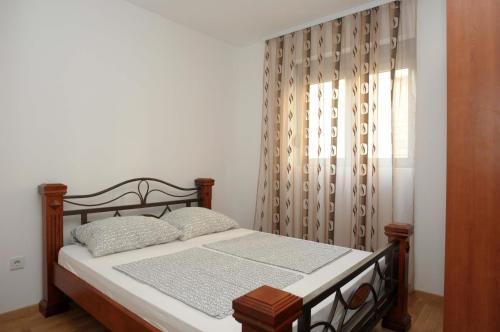 Katil atau katil-katil dalam bilik di Adelisa Apartments