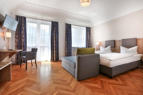 Postel nebo postele na pokoji v ubytování Hotel Schiffmeister